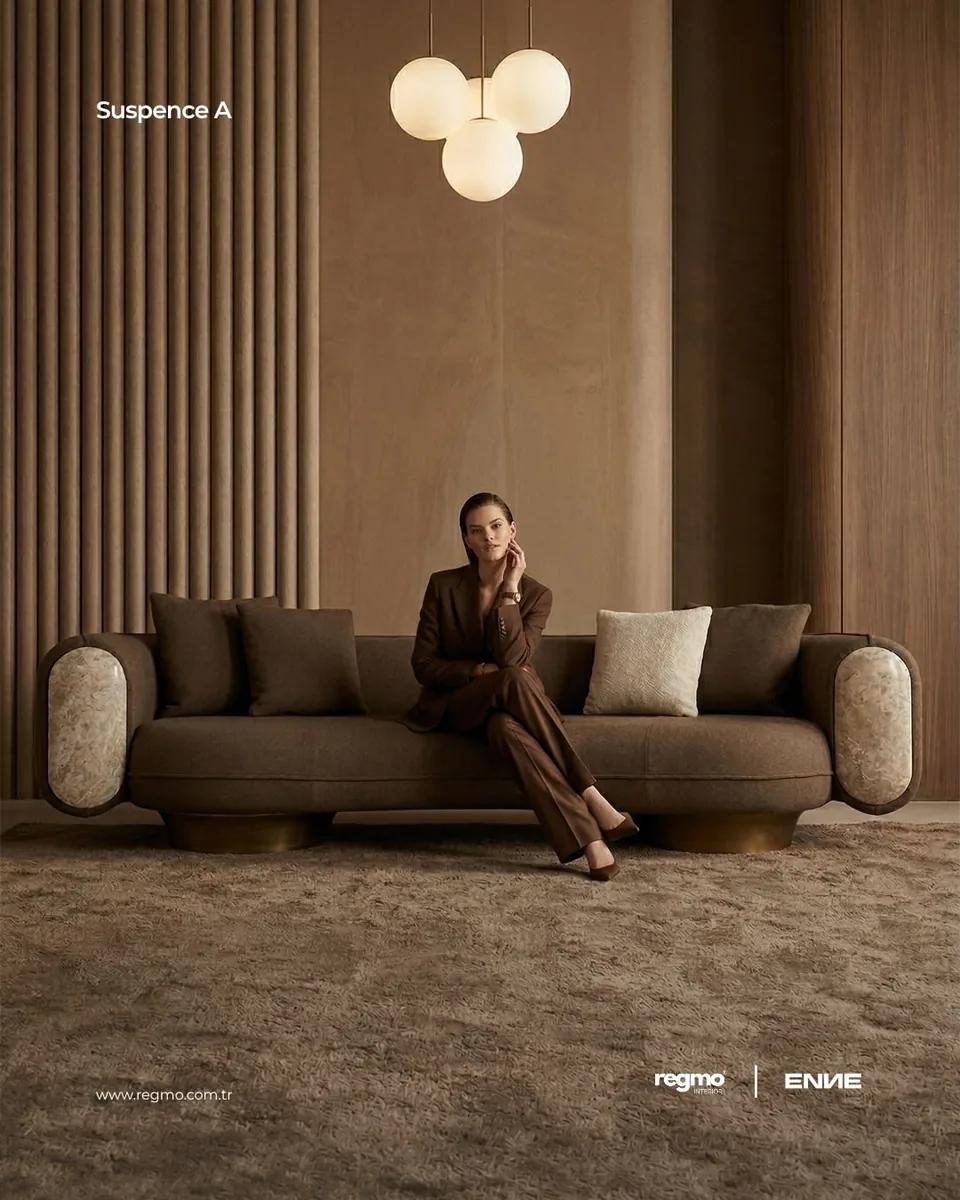 A sofa styled against a ribbed wooden wall